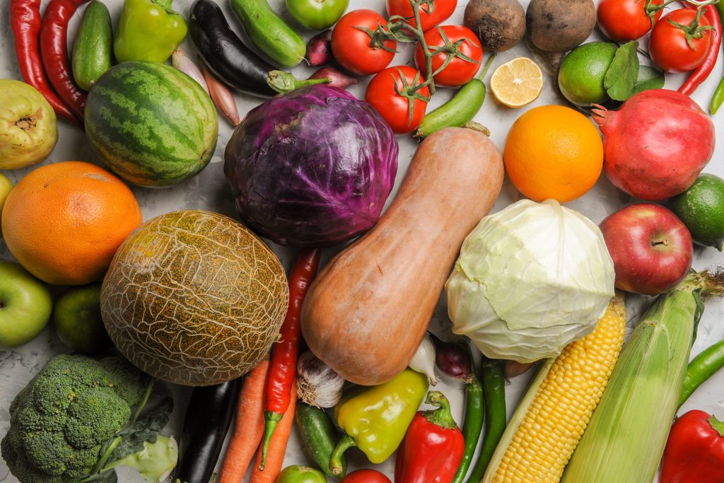 top-view-fresh-vegetables-composition-white-background-min